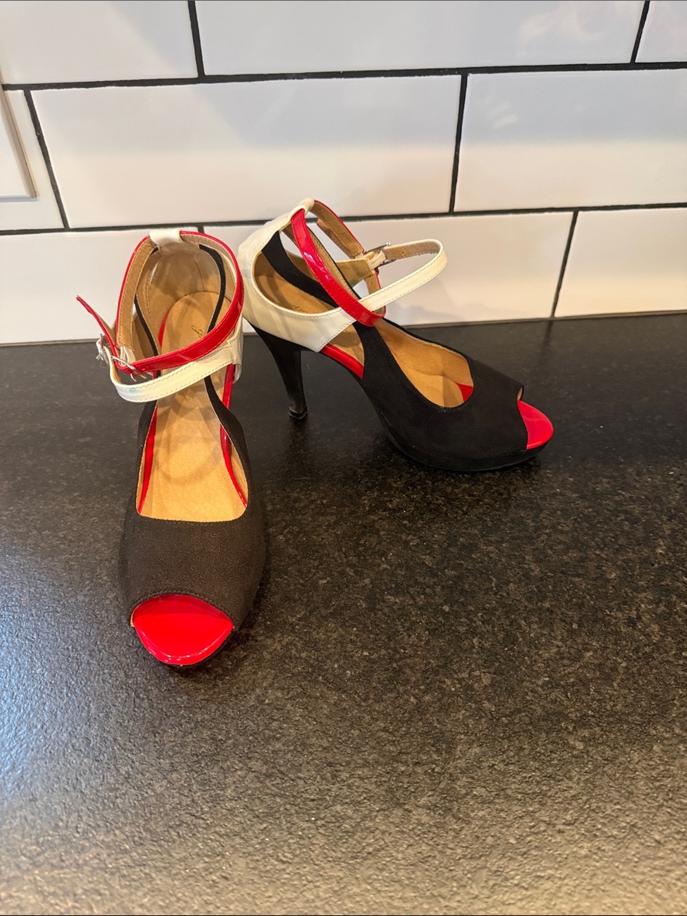 Black Peep-Toe Heels with Red Accents and Cream Ankle Strap